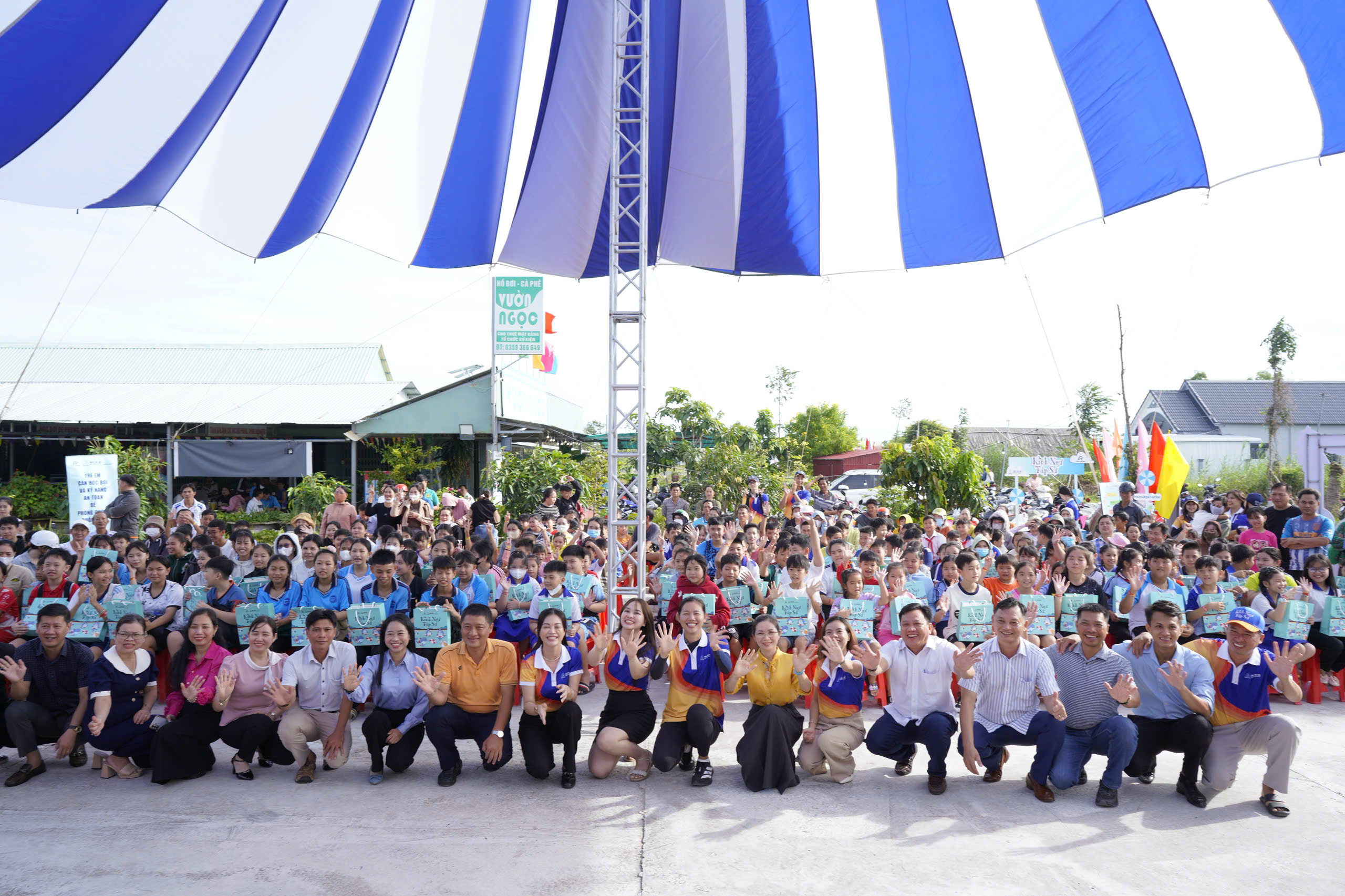 A group of people posing for a photo  AI-generated content may be incorrect.